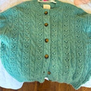 Gorgeous and ultra soft  Dôen cardigan in a beautiful sage green. Never worn